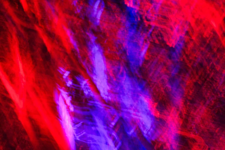 a blurry image of a tree with red and blue lights, by Jan Rustem, lyrical abstraction, purple and red color bleed, abstract neon shapes, 1 0 2 4 farben abstract, excitement