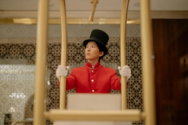 a woman in a top hat is on a swing, capsule hotel, production still, square, high-quality photo