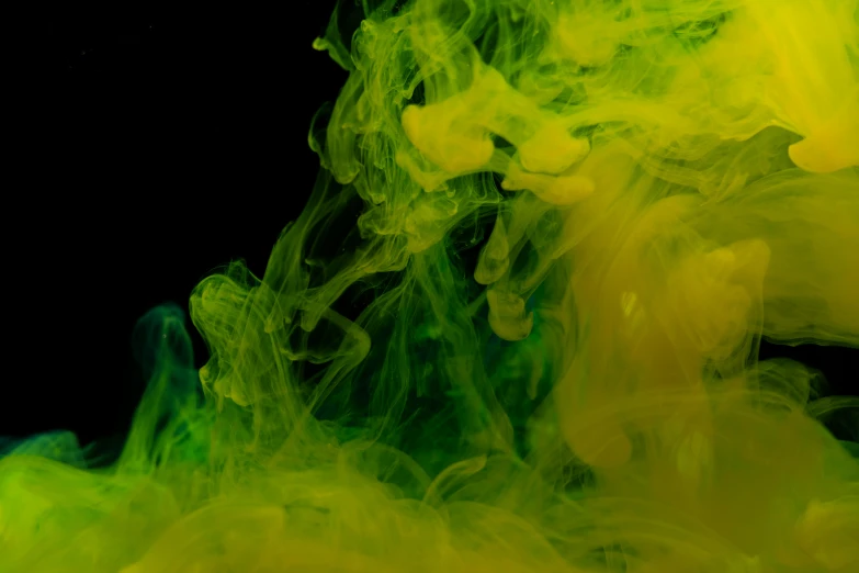 a close up of a yellow and green substance, inspired by Kim Keever, pexels, background ( dark _ smokiness ), neon ink, thc