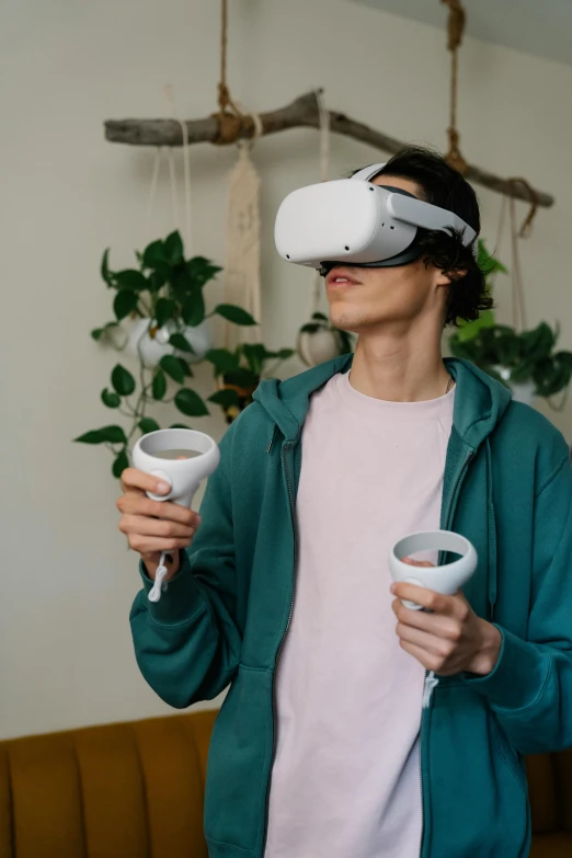 a man standing in a living room holding a video game controller, a hyperrealistic painting, by Sebastian Vrancx, trending on unsplash, oculus quest 2, with a white mug, big googles over her head, an alien drinking horchata