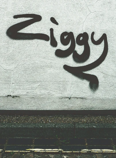 the word ziggy painted on the side of a building, an album cover, cgsociety, smog on the floor, 2 5 6 x 2 5 6 pixels, cozy vibe, large)}]