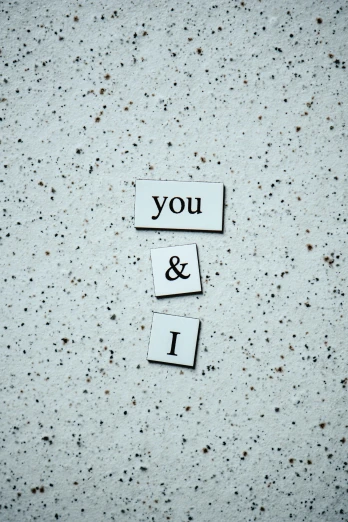 a piece of paper that says you and i, by artist, unsplash, magnetic, ceramic, 15081959 21121991 01012000 4k, icon