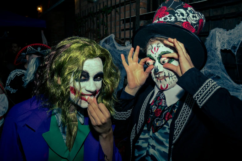 a couple of people that are standing next to each other, lowbrow, halloween celebration, revellers, profile image