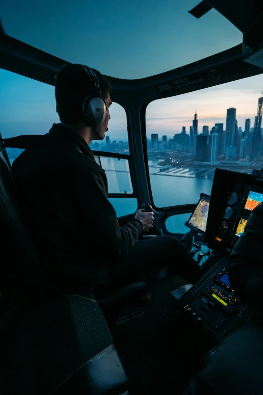 a man sitting in a helicopter looking out the window, chicago skyline, lasers in mid flight, in cockpit, high-quality photo
