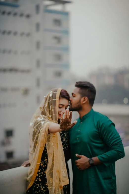 a man and woman standing next to each other, a picture, by Riza Abbasi, pexels contest winner, hurufiyya, hand on cheek, square, profile pose, 15081959 21121991 01012000 4k