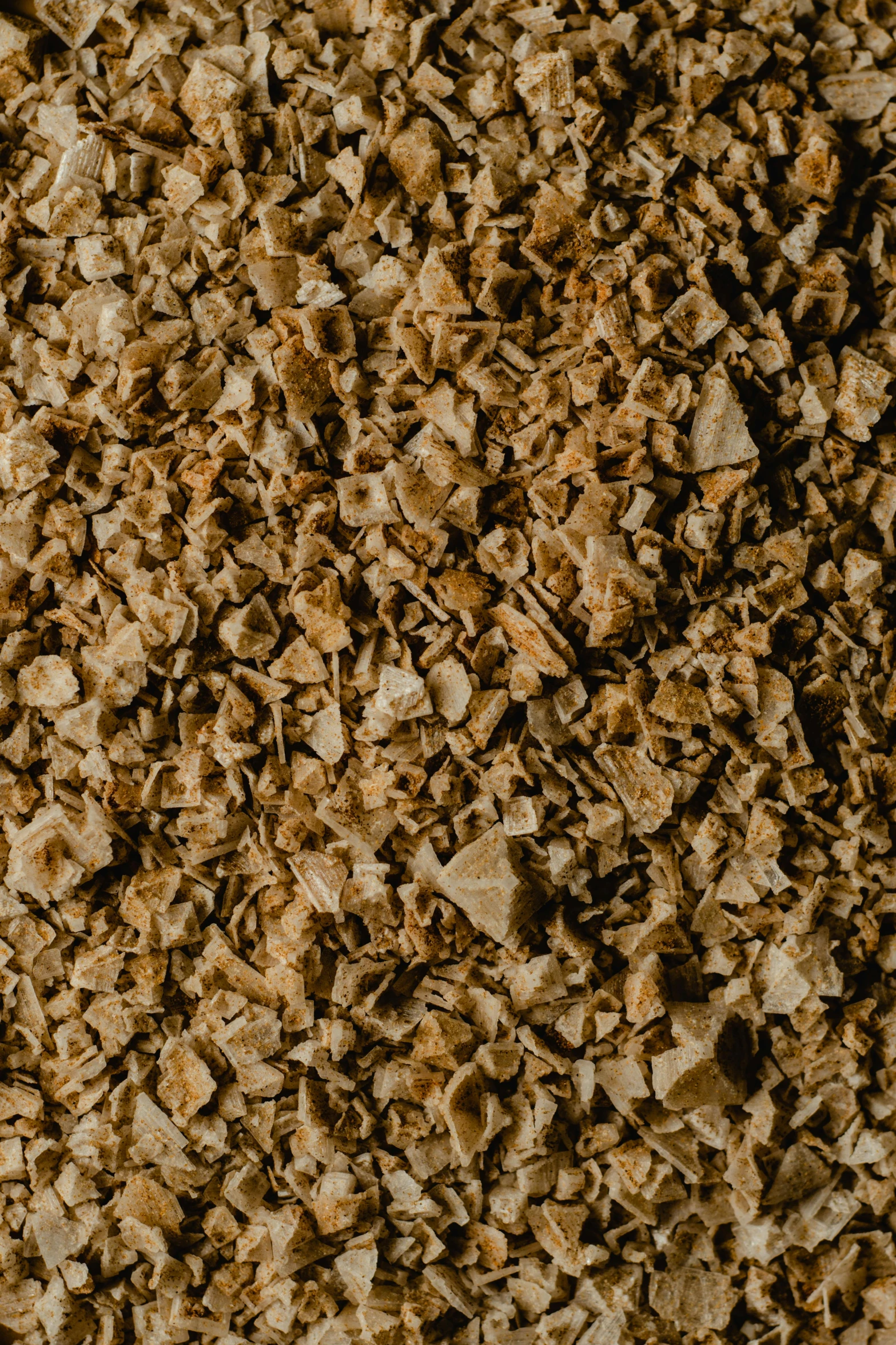 a close up of a pile of wood chips, trending on pexels, on the surface of an asteroid, beige, detailed product image, corn