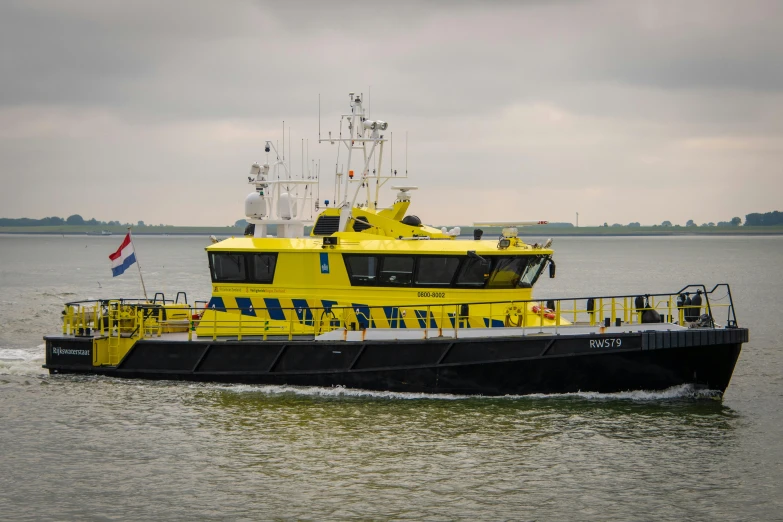 a yellow and black boat on a body of water, by Schelte a Bolswert, pixabay, hurufiyya, automated defence platform, offshore winds, high quality photo, portrait photo