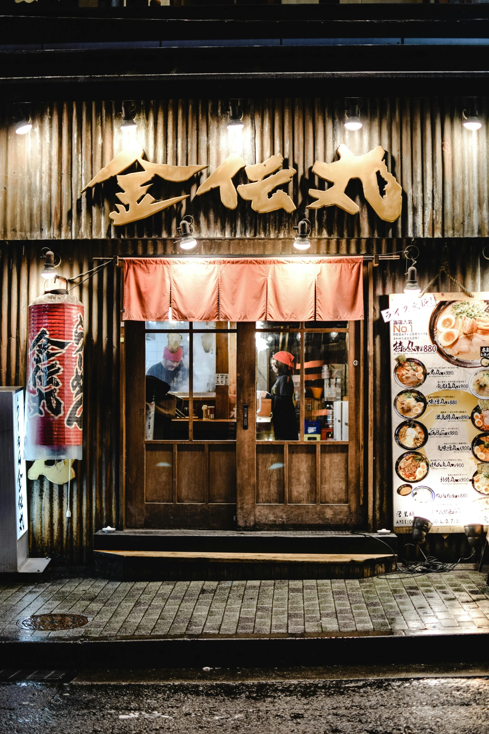 a man standing in front of a restaurant at night, by Sengai, unsplash, shop front, a wooden, style of shuzo oshimi, sana takeda