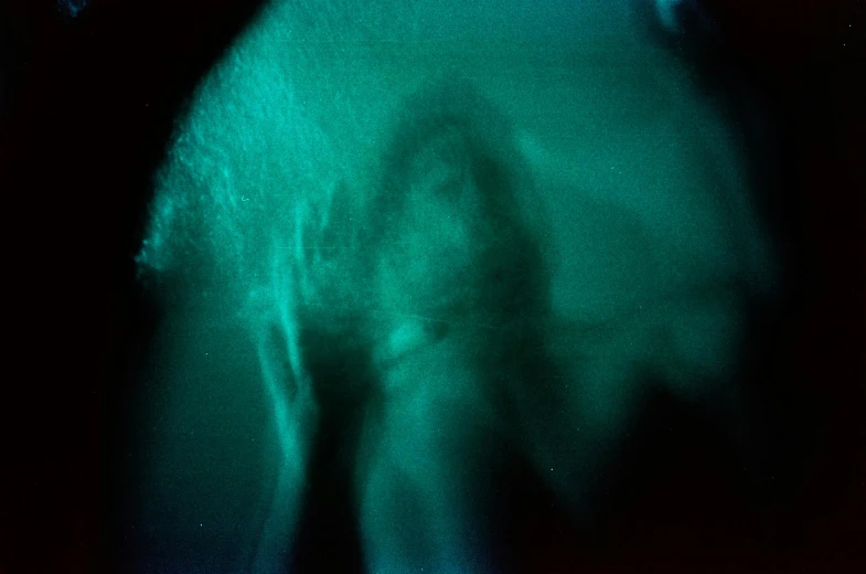 an image of a polar bear in the dark, an album cover, inspired by Germaine Krull, unsplash, holography, turquoise, abstract human body, petra collins, archival pigment print