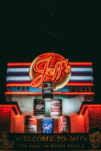 a neon sign on the side of a building, by Jason Felix, pexels contest winner, large jars on shelves, portrait of jughead jones, beef, 15081959 21121991 01012000 4k