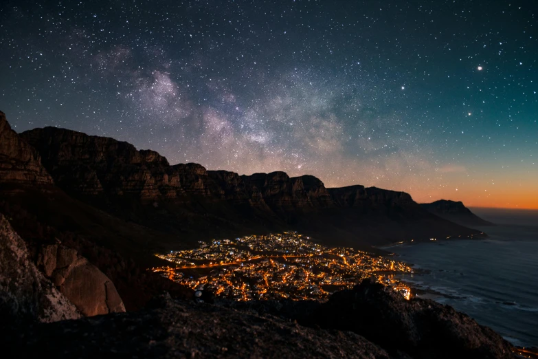 the night sky over the city of cape town, south africa, pexels contest winner, magical realism, fine art print, multiple stories, high quality image, looking off into the distance