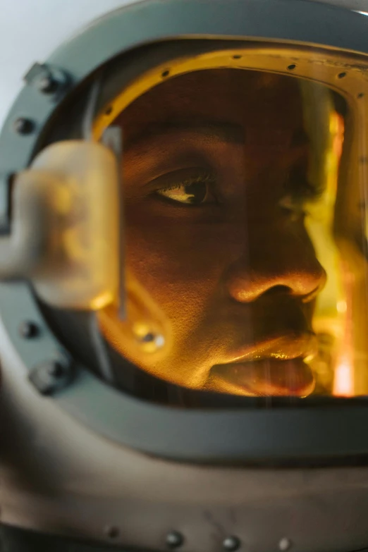 a close up of a person wearing a helmet, a picture, by David Donaldson, pexels contest winner, afrofuturism, portrait of astronaut, at netflix, reflecting, opening shot