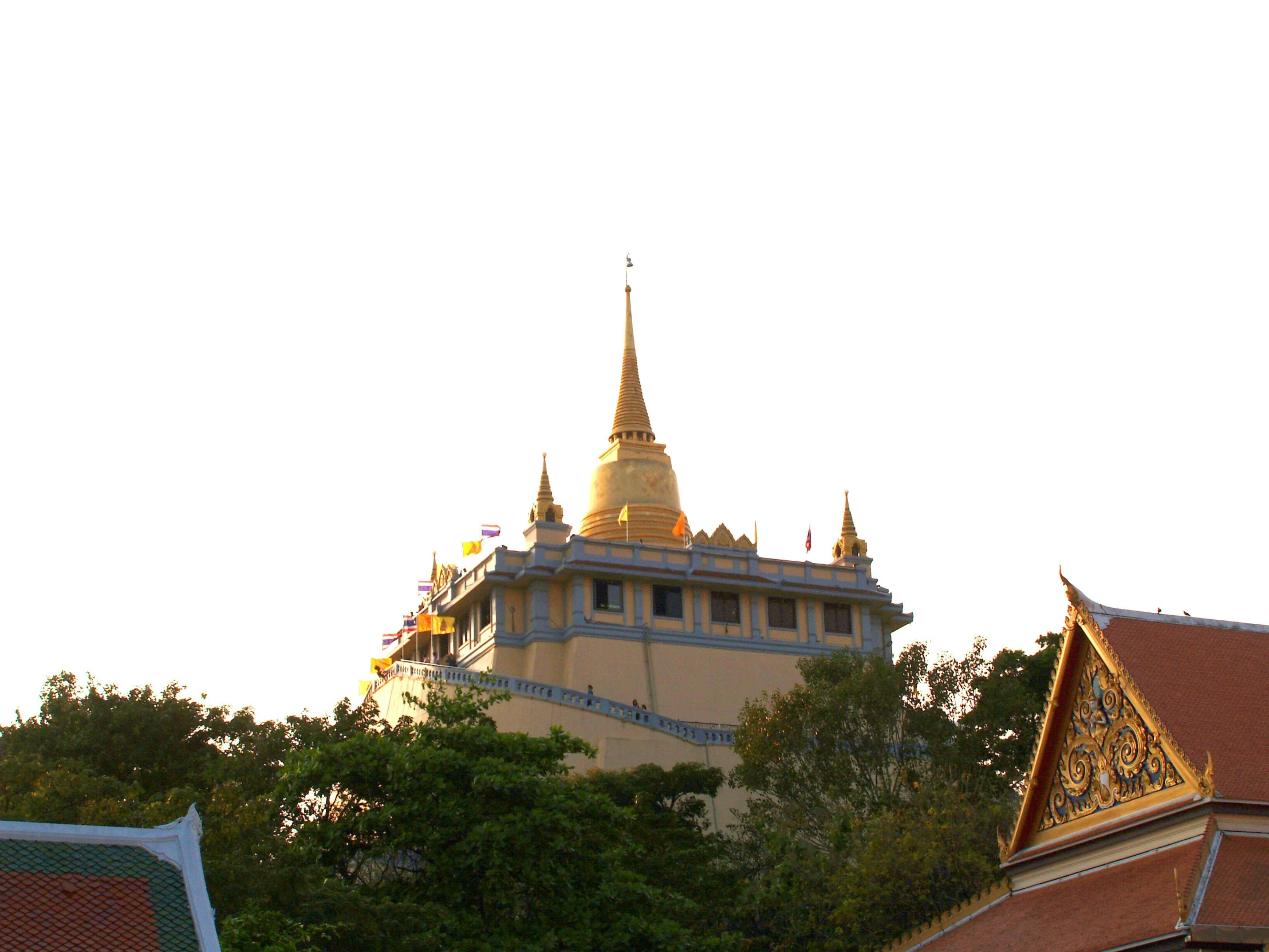 a large building with a golden spire on top of it, buzzed hair on temple, seaview, high elevation, light from top right