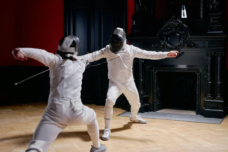 a couple of men standing on top of a wooden floor, fencing, youtube thumbnail, off-white plated armor, getty images