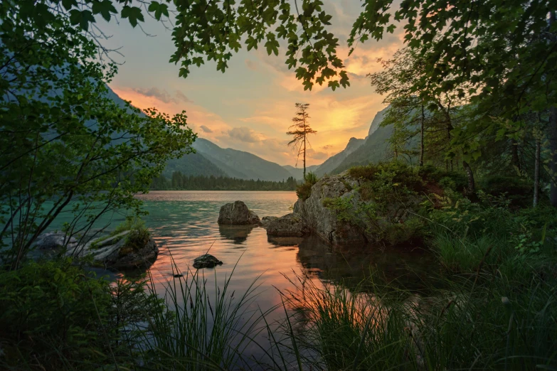 a large body of water surrounded by trees, a picture, by Harry Haenigsen, pexels contest winner, romanticism, mountain sunrise, lpoty, high quality print, summer evening