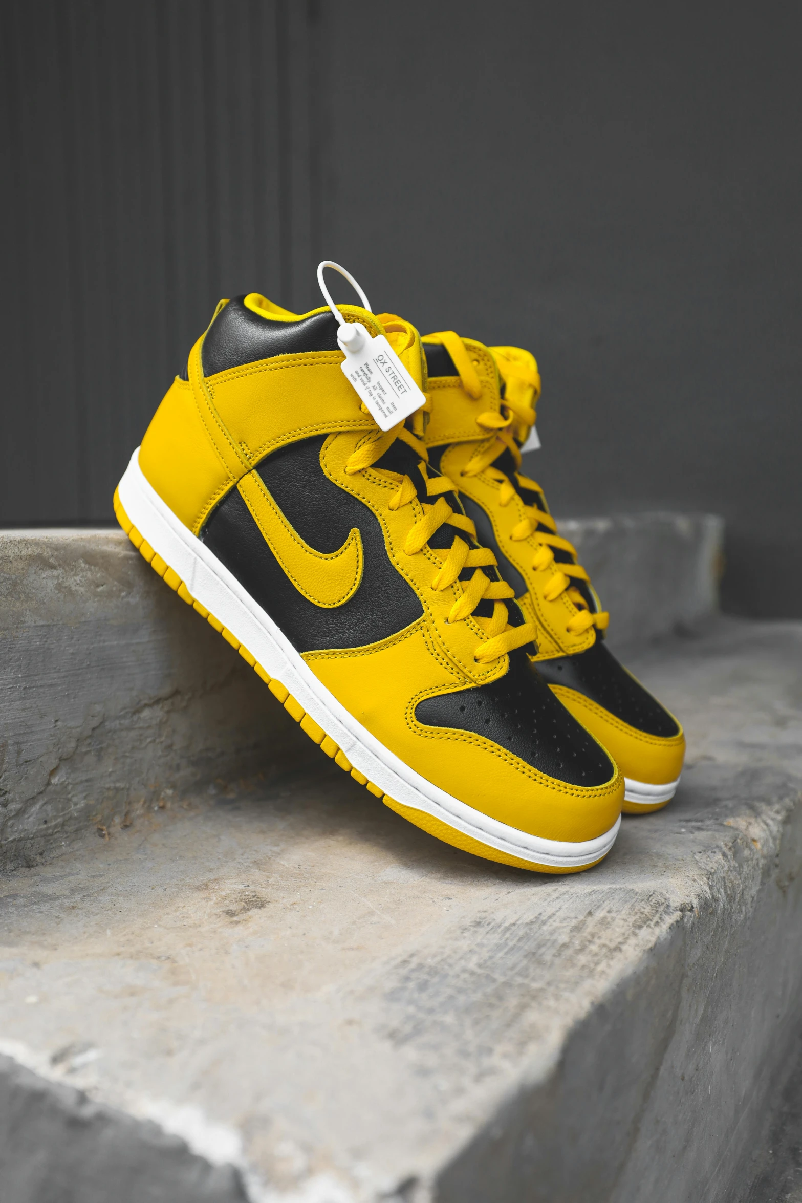 a pair of yellow and black sneakers, unsplash, golden pauldrons, nike, super high resolution, mono-yellow