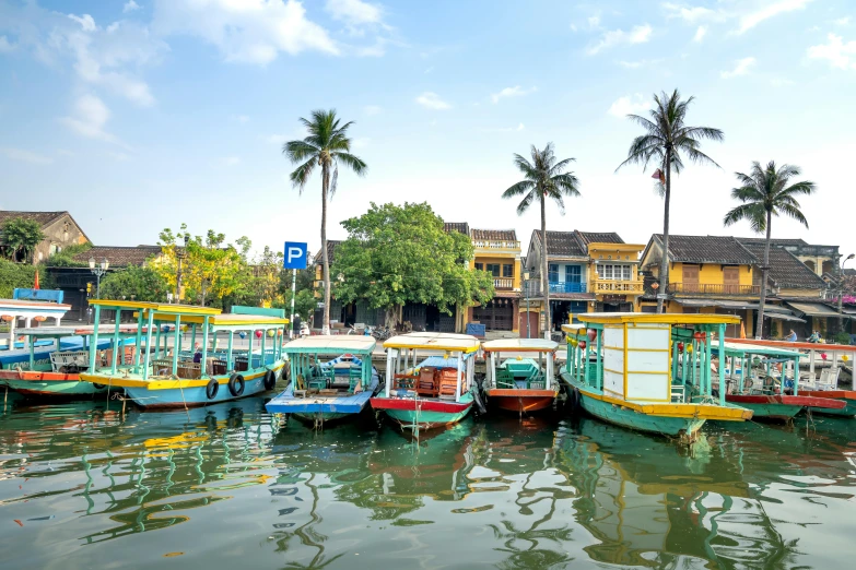 a number of boats in a body of water, pexels contest winner, ao dai, 🦩🪐🐞👩🏻🦳, square, avatar image