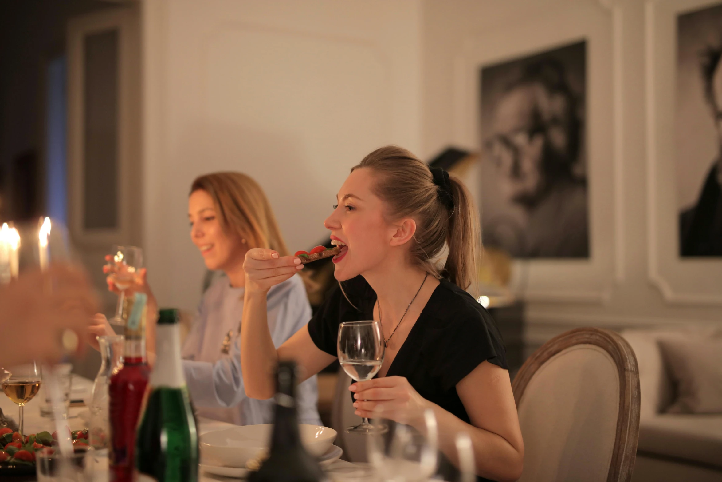 a group of people sitting around a dinner table, profile image, french girl, devouring, colour corrected