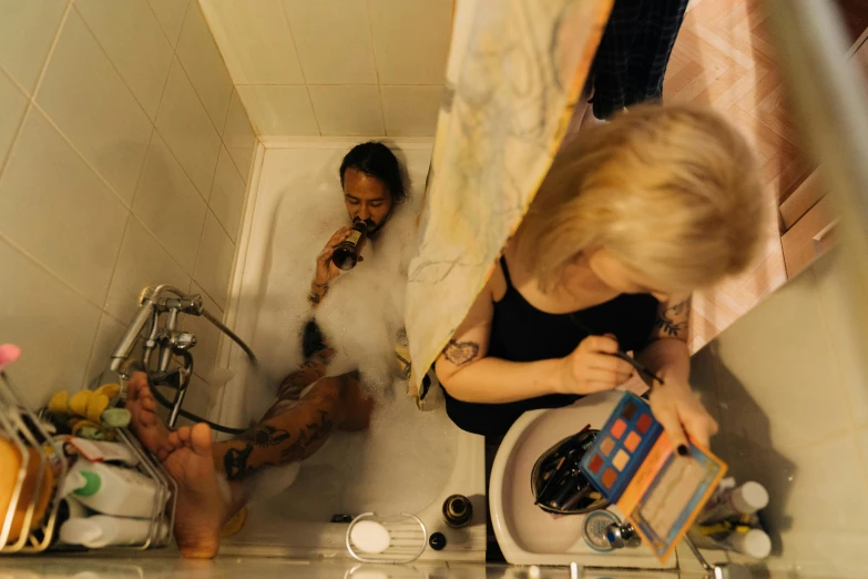 a couple of people that are in a bathtub, inspired by Nan Goldin, reddit, process art, smoking a bowl of hash together, gopro photo, ilustration, high-quality photo