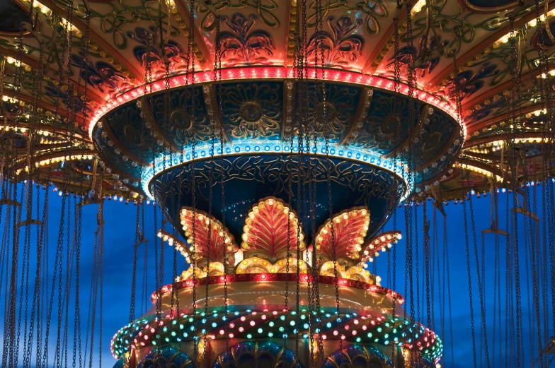 a merry merry merry merry merry merry merry merry merry merry merry merry merry merry merry merry merry, by Konrad Witz, pexels contest winner, kinetic art, fairground rides, blue and orange lighting, avatar image