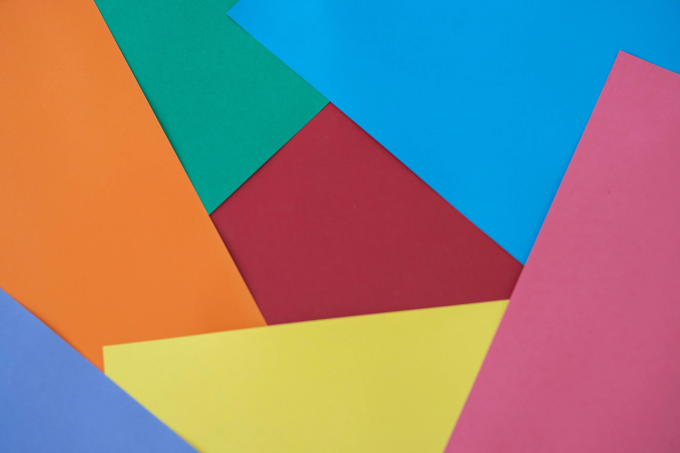 a bunch of different colored paper on top of each other, inspired by Johannes Itten, pexels, detailed product image, geometric colorful, full of colour w 1024, matte surface
