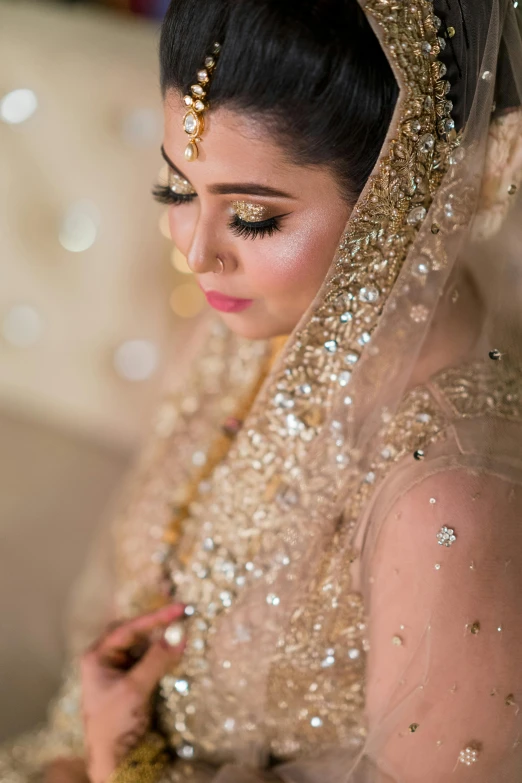 a close up of a woman in a wedding dress, a picture, inspired by Ambreen Butt, pexels contest winner, glistening gold, thumbnail, side portrait imagery, high angle close up shot