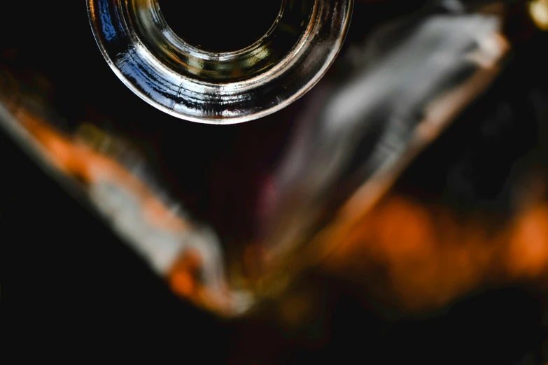 a close up of a glass bottle on a table, unsplash, lyrical abstraction, rum, medium format, thumbnail