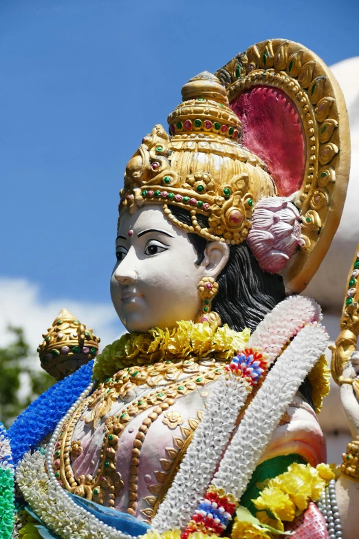 a close up of a statue of a person on a horse, cybertronic hindu temple, blue sky, avatar image