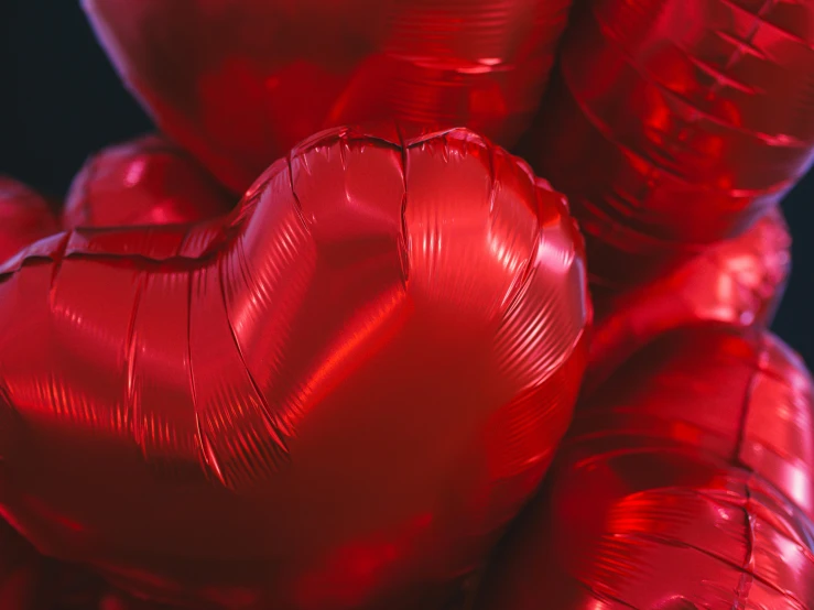 a bunch of red heart shaped balloons, by Julia Pishtar, pexels contest winner, hyperrealism, metallic polished surfaces, closeup photograph, 15081959 21121991 01012000 4k, foil