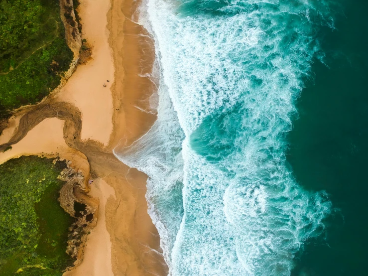 a large body of water next to a sandy beach, pexels contest winner, airborne view, ocean spray, deeply hyperdetailed, beach is between the two valleys