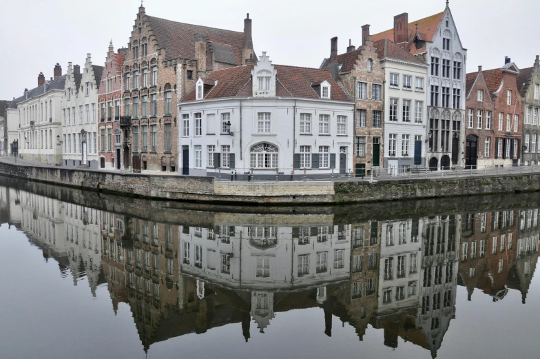 a row of buildings next to a body of water, by Jan Tengnagel, pexels contest winner, renaissance, belgium, whitewashed buildings, square, panoramic