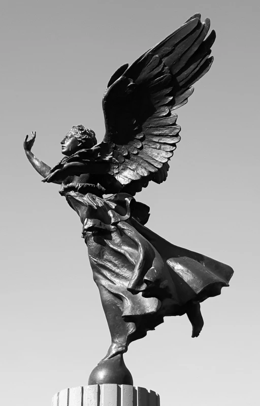 a black and white photo of a statue of an angel, a statue, by Alexander Deyneka, unsplash, art nouveau, made of bronze, andrey gordeev, soaring, high resolution image