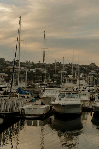 a number of boats in a body of water, manly, moody evening light, bay area, today\'s featured photograph 4k