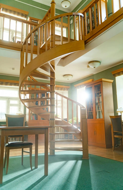 a living room filled with furniture and a spiral staircase, inspired by Constantin Hansen, art nouveau, biodiversity heritage library, natural morning light, medium-shot, studying