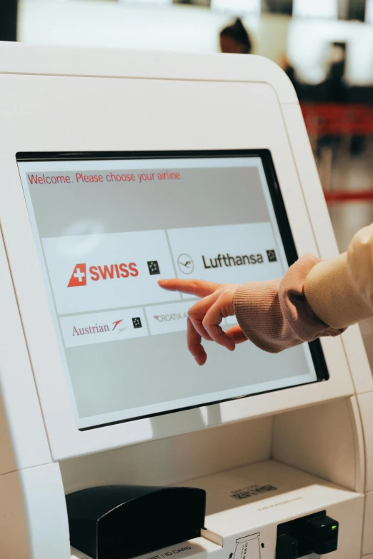 a man points at the screen of a self service kiosk, a digital rendering, by Daniel Lieske, unsplash, swiss design, luggage, with a white, scientific