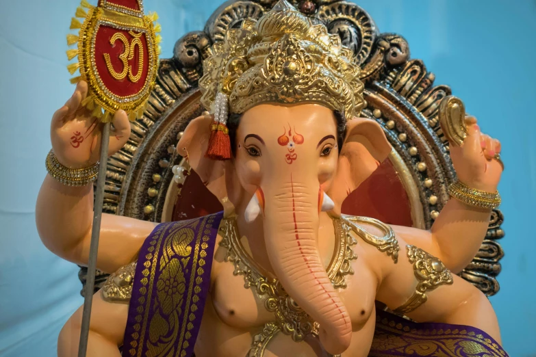 a close up of a statue of an elephant, a statue, by Carey Morris, pexels contest winner, samikshavad, attractive male deity, fallas party figures, thumbnail, 3 4 5 3 1