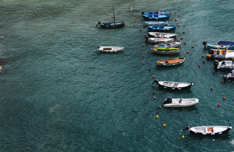 a group of boats floating on top of a body of water, by Elsa Bleda, pexels contest winner, renaissance, cinq terre, thumbnail, cornwall, high quality image