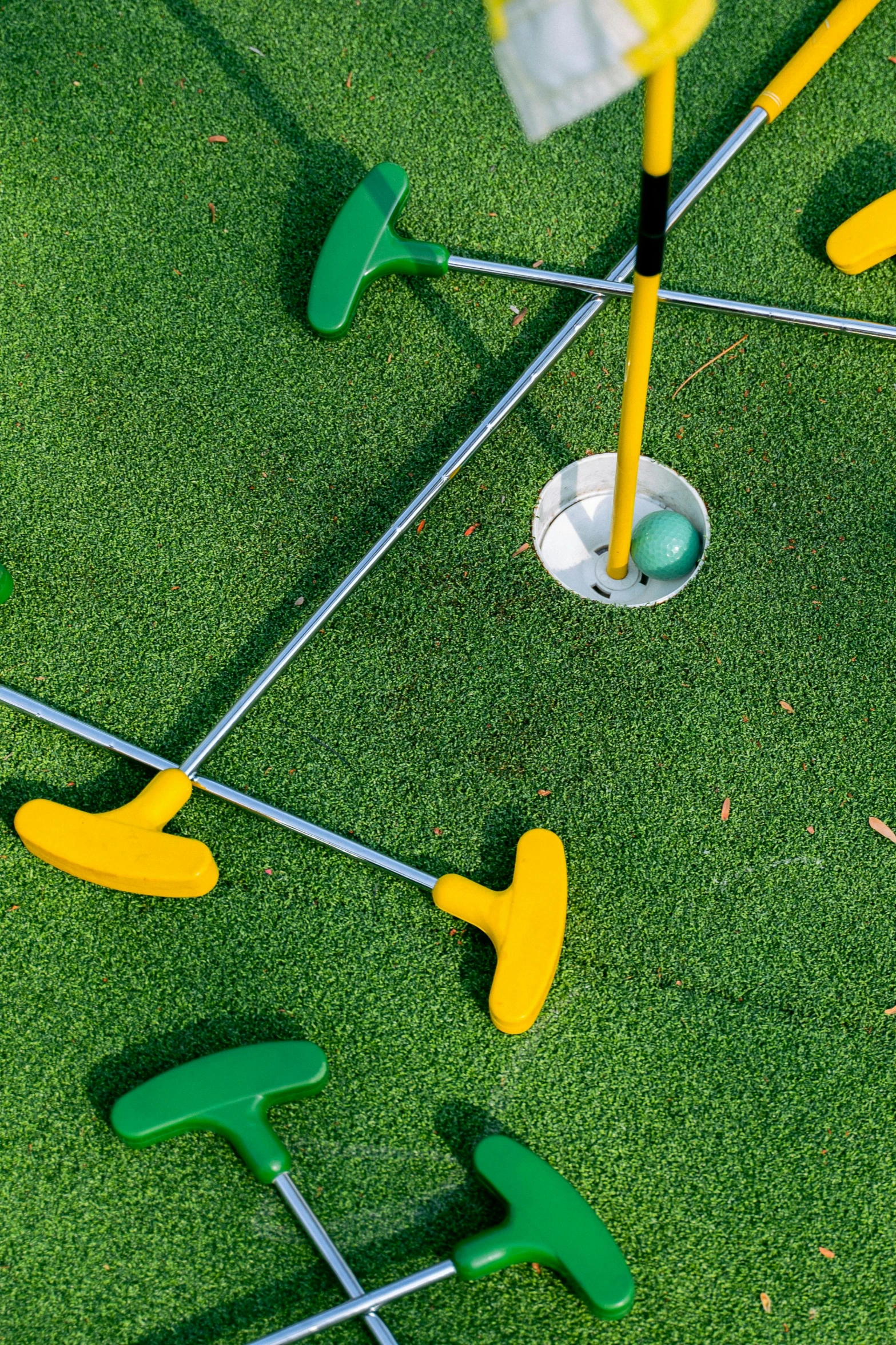 a putt putt putt putt putt putt putt putt putt putt putt putt putt put, by Julia Pishtar, dribble, high angle close up shot, stanchions, zoomed in, square