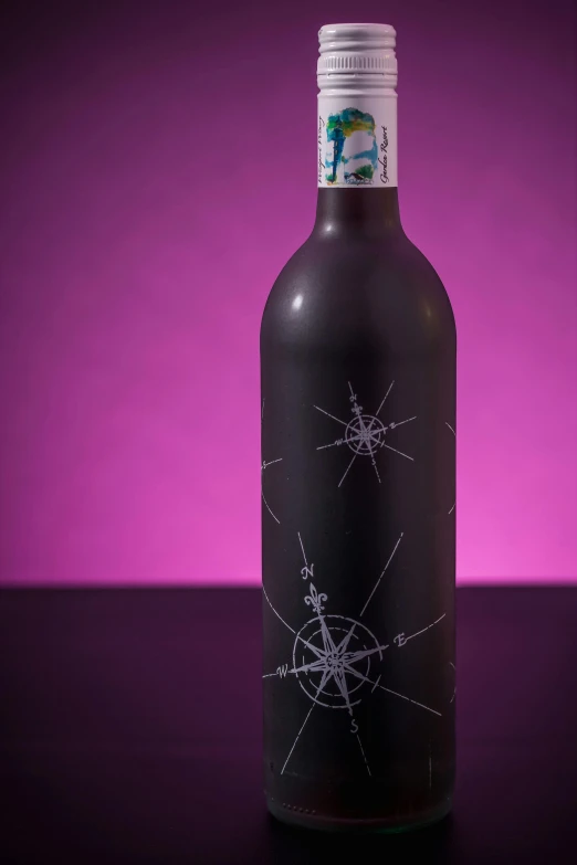 a bottle of wine sitting on top of a table, by Joseph Severn, with a star - chart, made of liquid purple metal, product design shot, sail