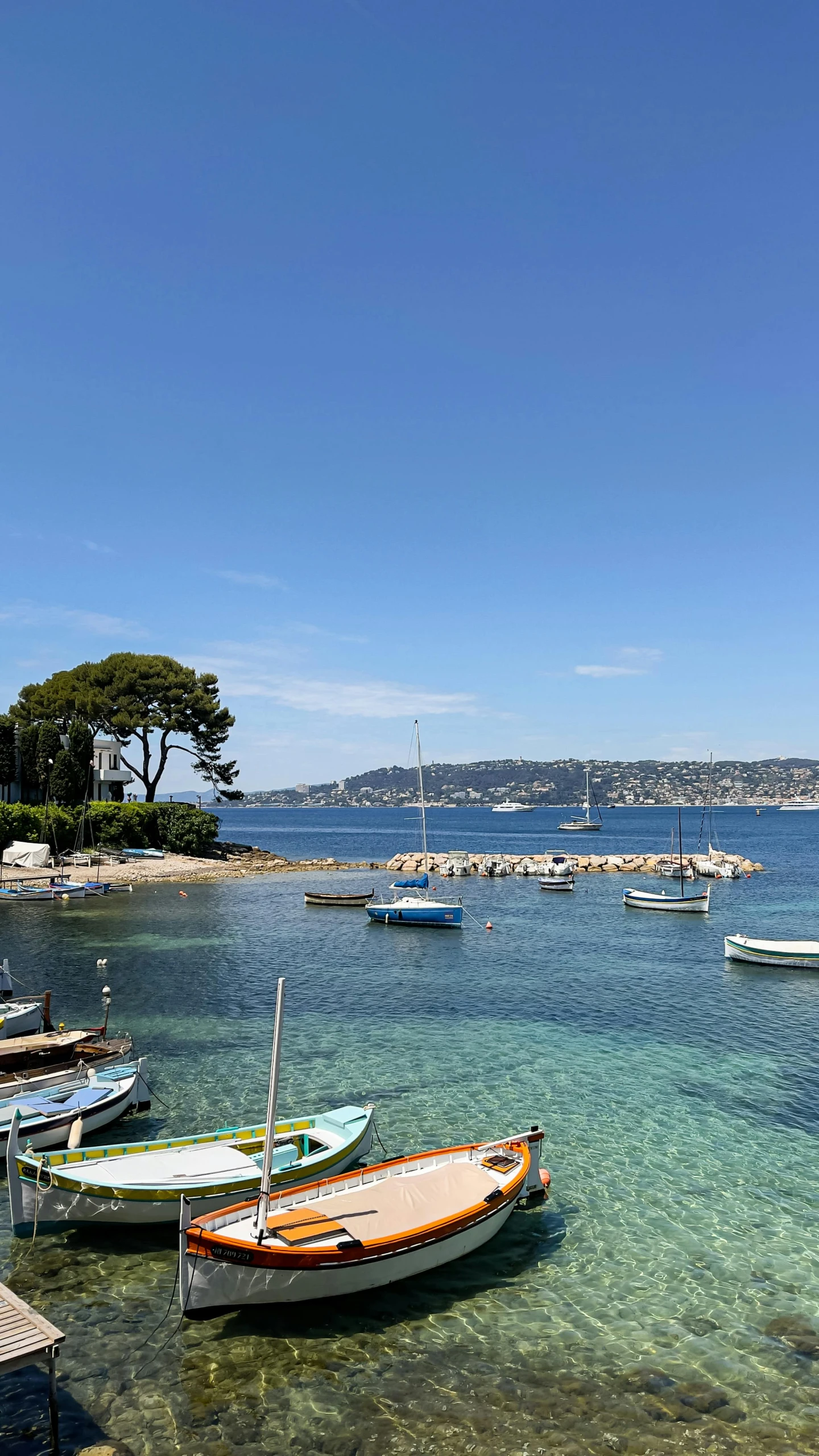 a number of boats in a body of water, les nabis, nice weather, island in the background, conde nast traveler photo, today\'s featured photograph 4k