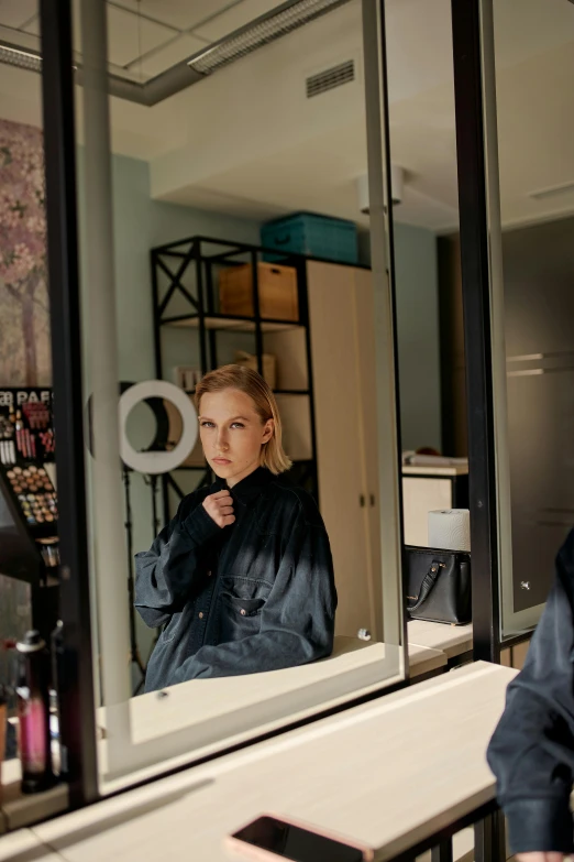 a woman that is standing in front of a mirror, a portrait, inspired by Nan Goldin, unsplash, hyperrealism, ignant, portrait of mia farrow, behind the scenes photo, still image from tv series