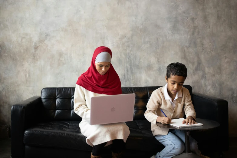 a couple of people sitting on a couch with laptops, by Maryam Hashemi, hurufiyya, maths, with a kid, 15081959 21121991 01012000 4k, islamic