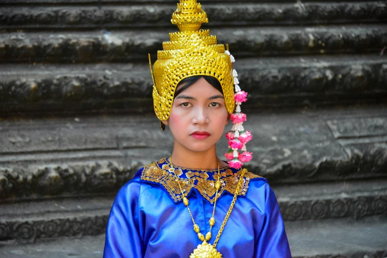 a close up of a person wearing a costume, inspired by Jin Nong, flickr, angkor wat, blue adornements, square, young female