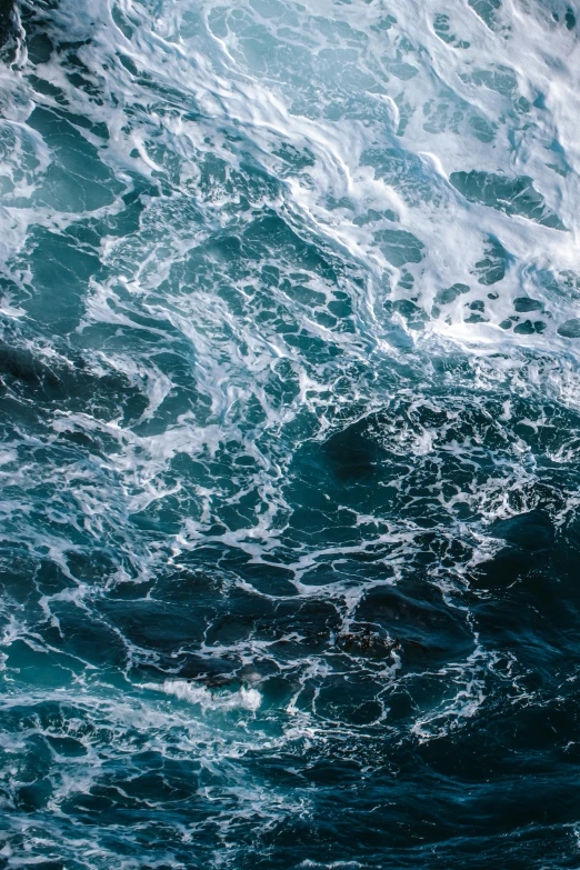 a man riding a wave on top of a surfboard, pexels contest winner, renaissance, deep blue sea color, standing in a maelstrom, deep texture, photo taken from a boat