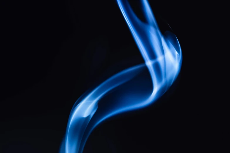 a close up of blue smoke on a black background, by Daniel Lieske, unsplash, casting a flame spell, swoosh, instagram post, profile image