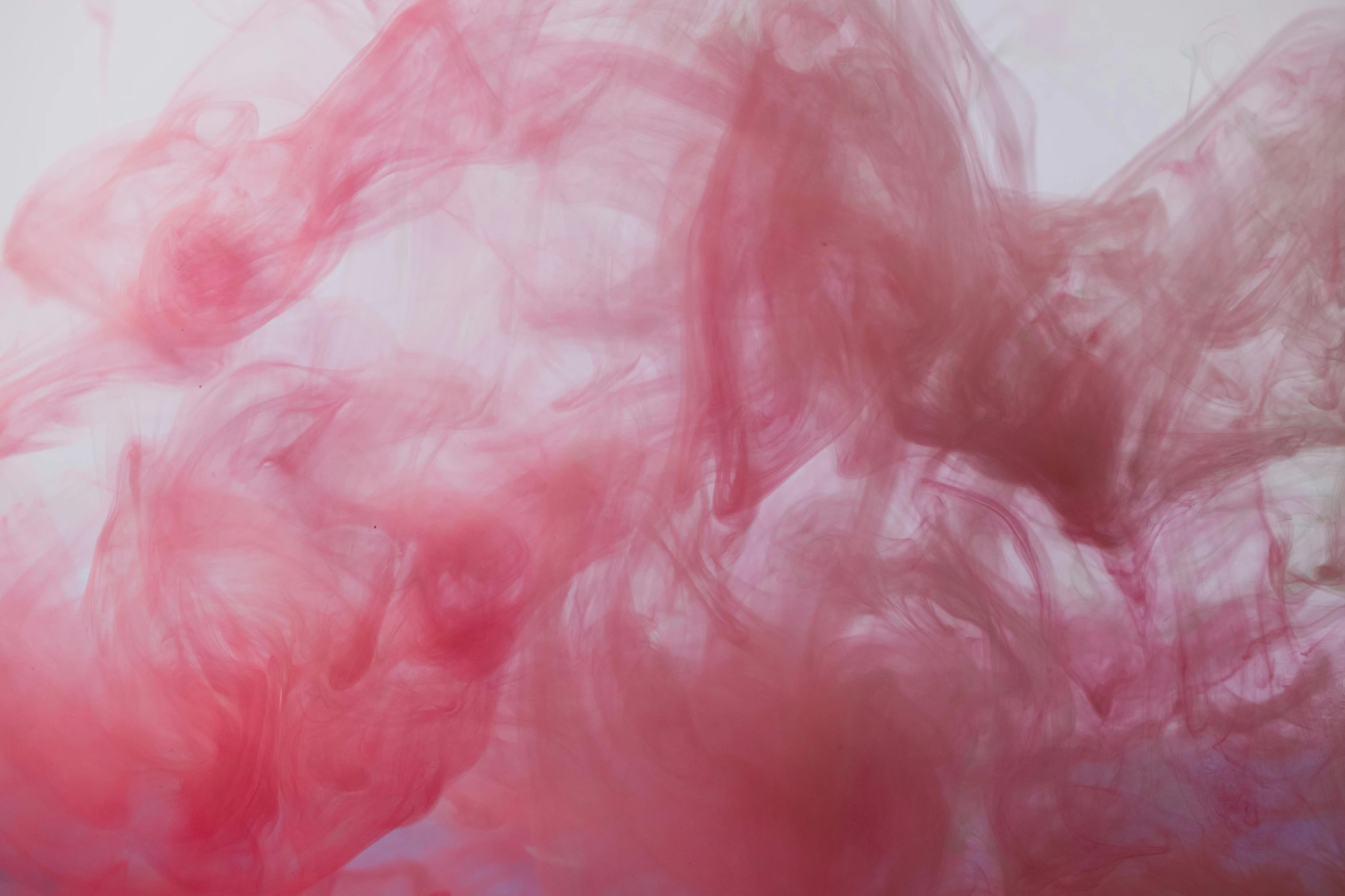 a close up of a pink substance in water, inspired by Kim Keever, pexels, abstract expressionism, soft vinyl, pale red, ((pink)), coloured