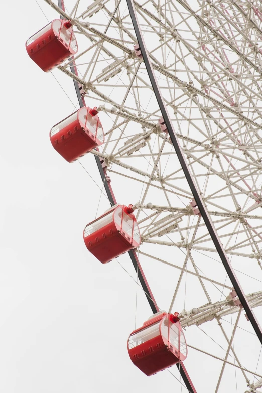 a large ferris wheel on a cloudy day, a portrait, by Sven Erixson, white red, detail shots, minimalist photo, 2022 photograph
