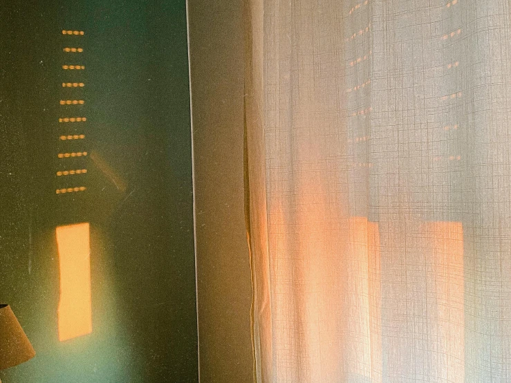 a bed sitting in a bedroom next to a window, an album cover, inspired by Elsa Bleda, pexels contest winner, light and space, orange yellow ethereal, curtain, difraction from back light, lines of lights