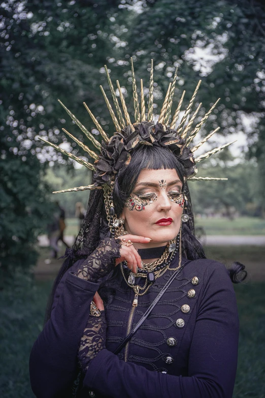 a woman with a crown on her head, an album cover, inspired by Hedi Xandt, unsplash, international gothic, wholesome techno - shaman lady, dressed in crustpunk clothing, festivals, taken in the early 2020s