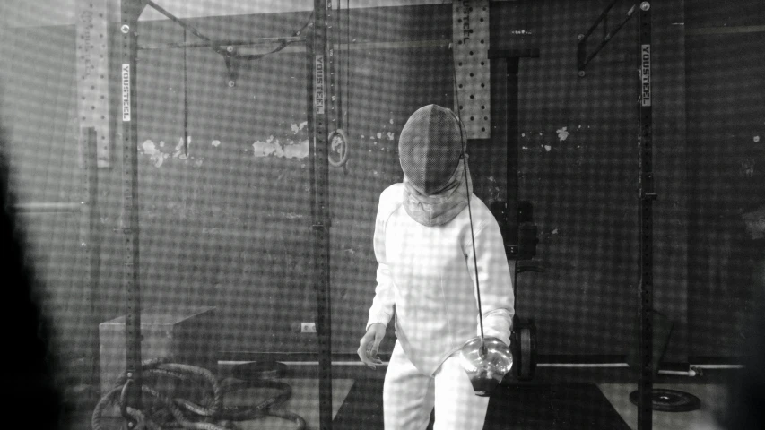 a black and white photo of a fencer, process art, iphone capture, glass helmets, female, shot with iphone 1 0